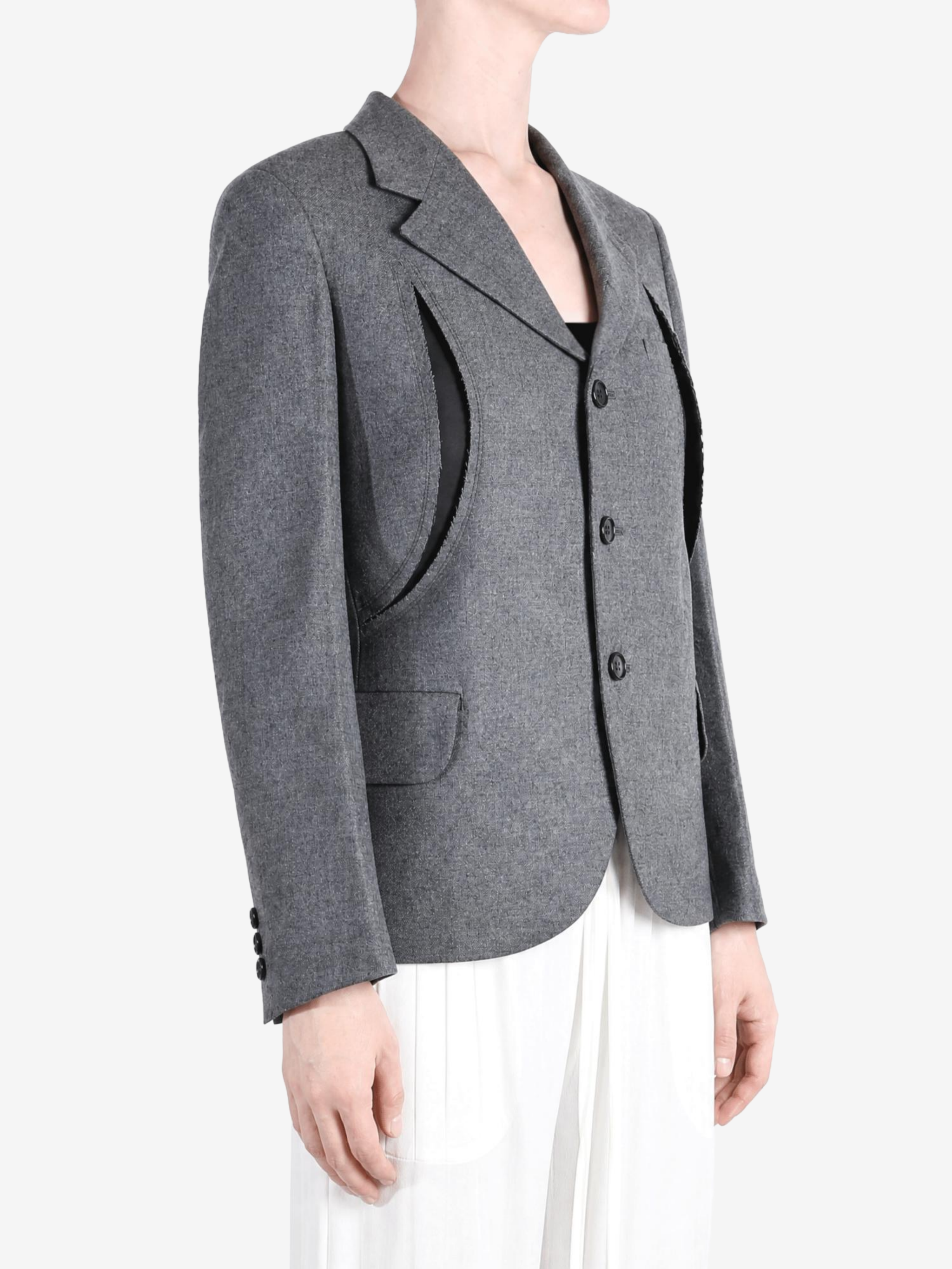 Grey jacket worn by a person, showing the jacket fit