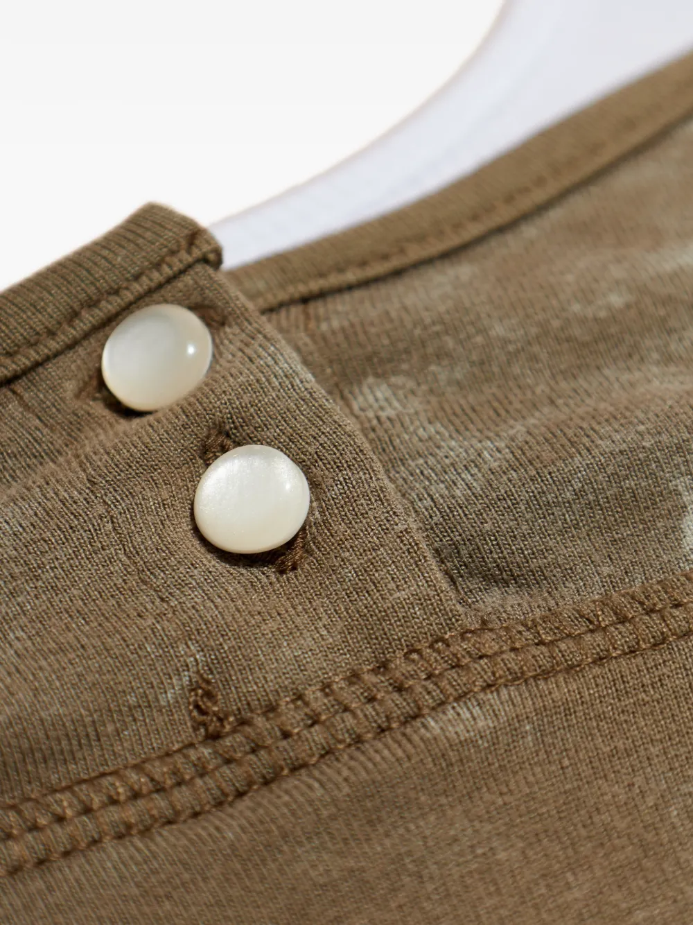 Close up of brown top, showing texture of the fabric