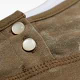 Close up of brown top, showing texture of the fabric