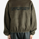 Brown sweatshirt worn by a person, showing the sweatshirt's fit