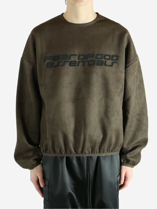 Brown sweatshirt worn by a person, showing the sweatshirt's fit