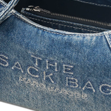 Close up of blue bags, showing texture of the cotton fabric