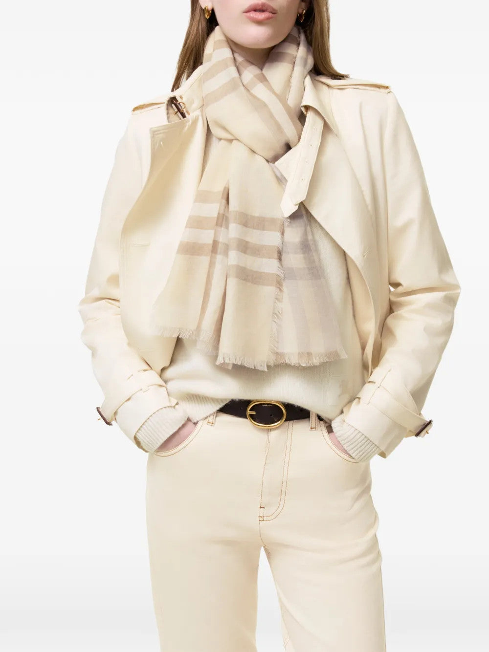 Tan scarf worn by a person, showing the scarf fit