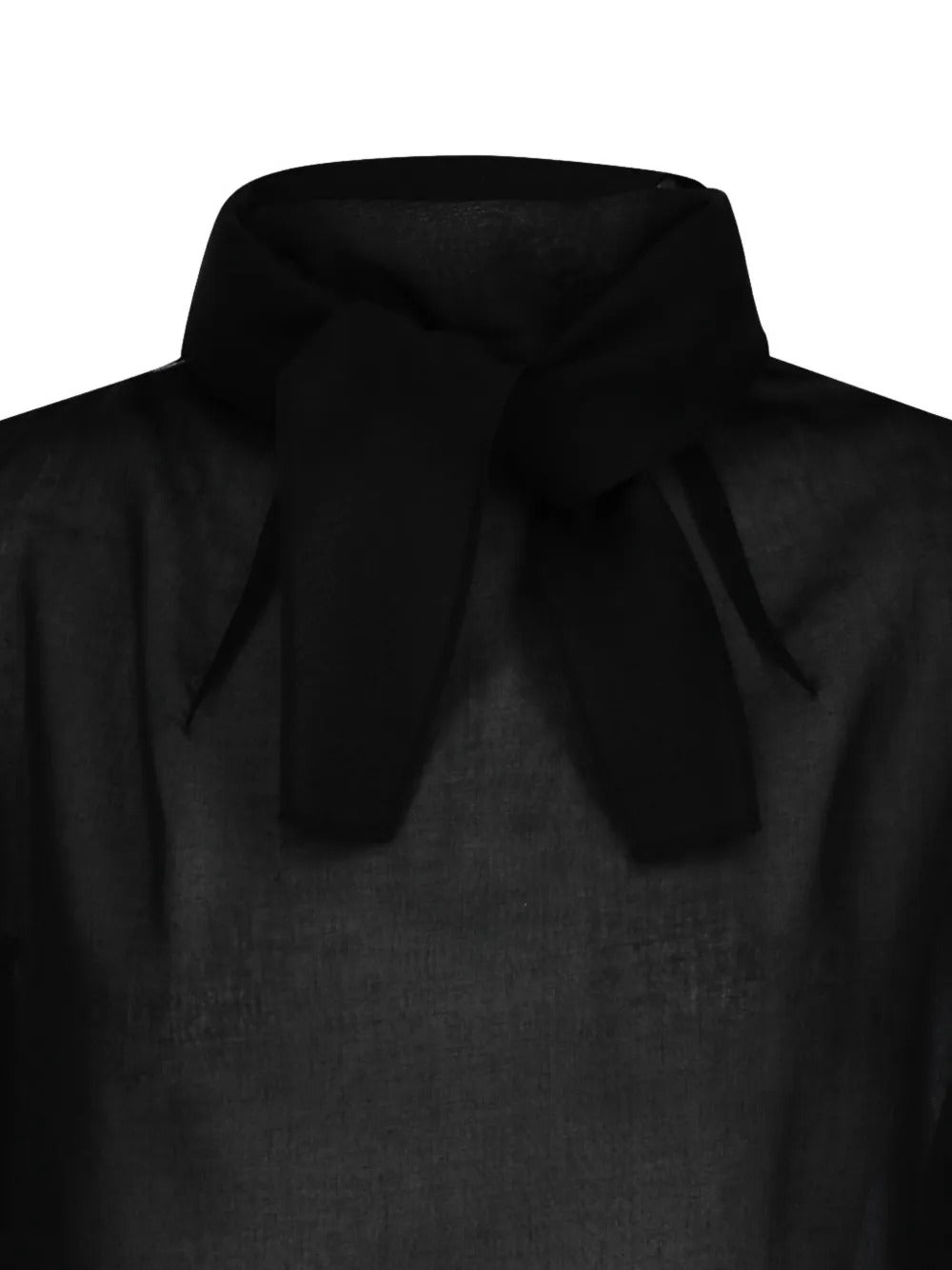 Close up of black top, showing texture of the polyester fabric