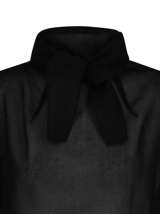 Close up of black top, showing texture of the polyester fabric