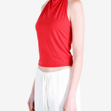 Red top worn by a person, showing the top fit