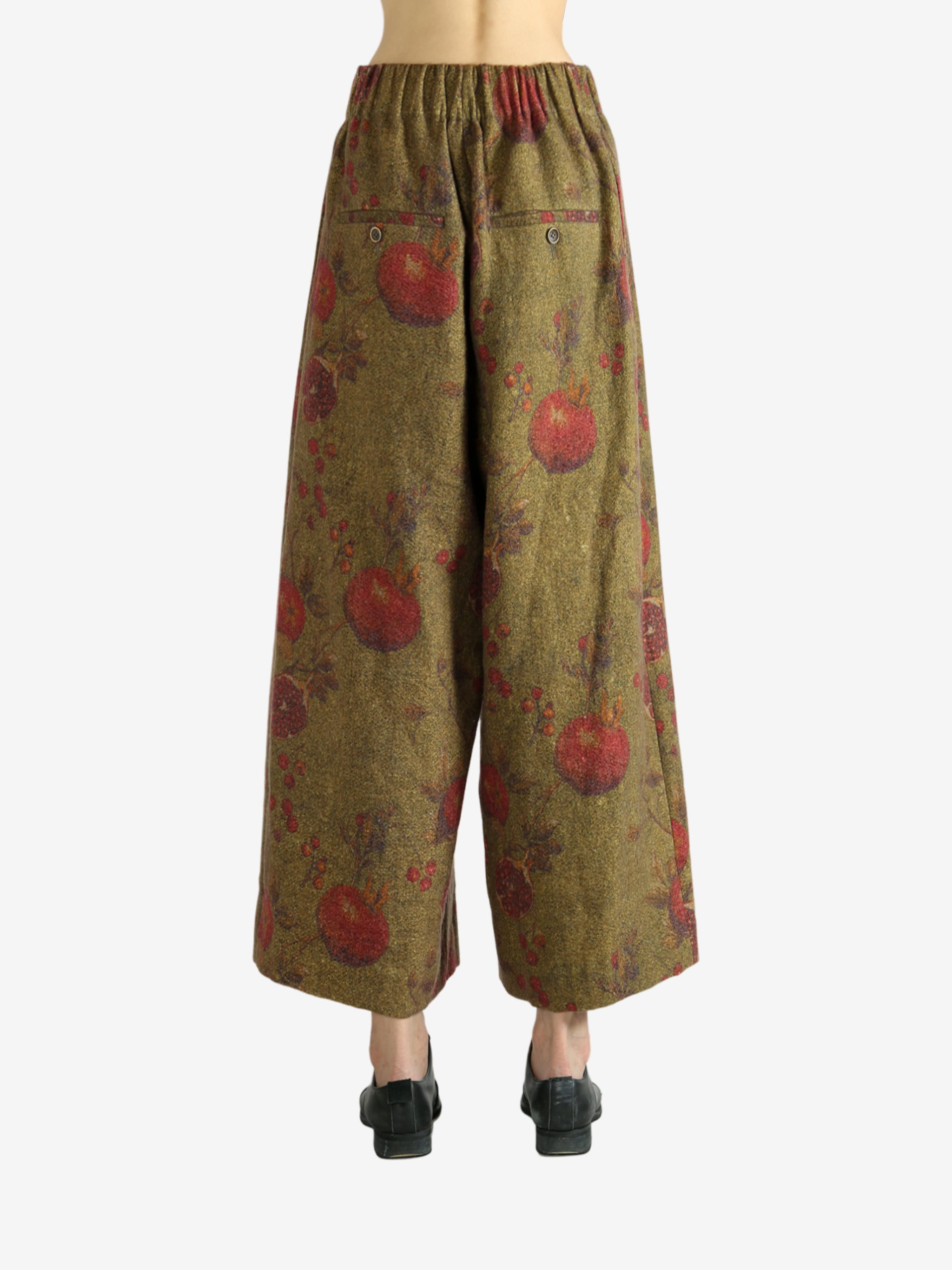 Tan pants worn by a person, showing the pants' fit