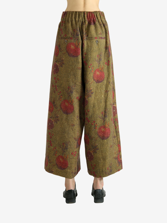 Tan pants worn by a person, showing the pants' fit