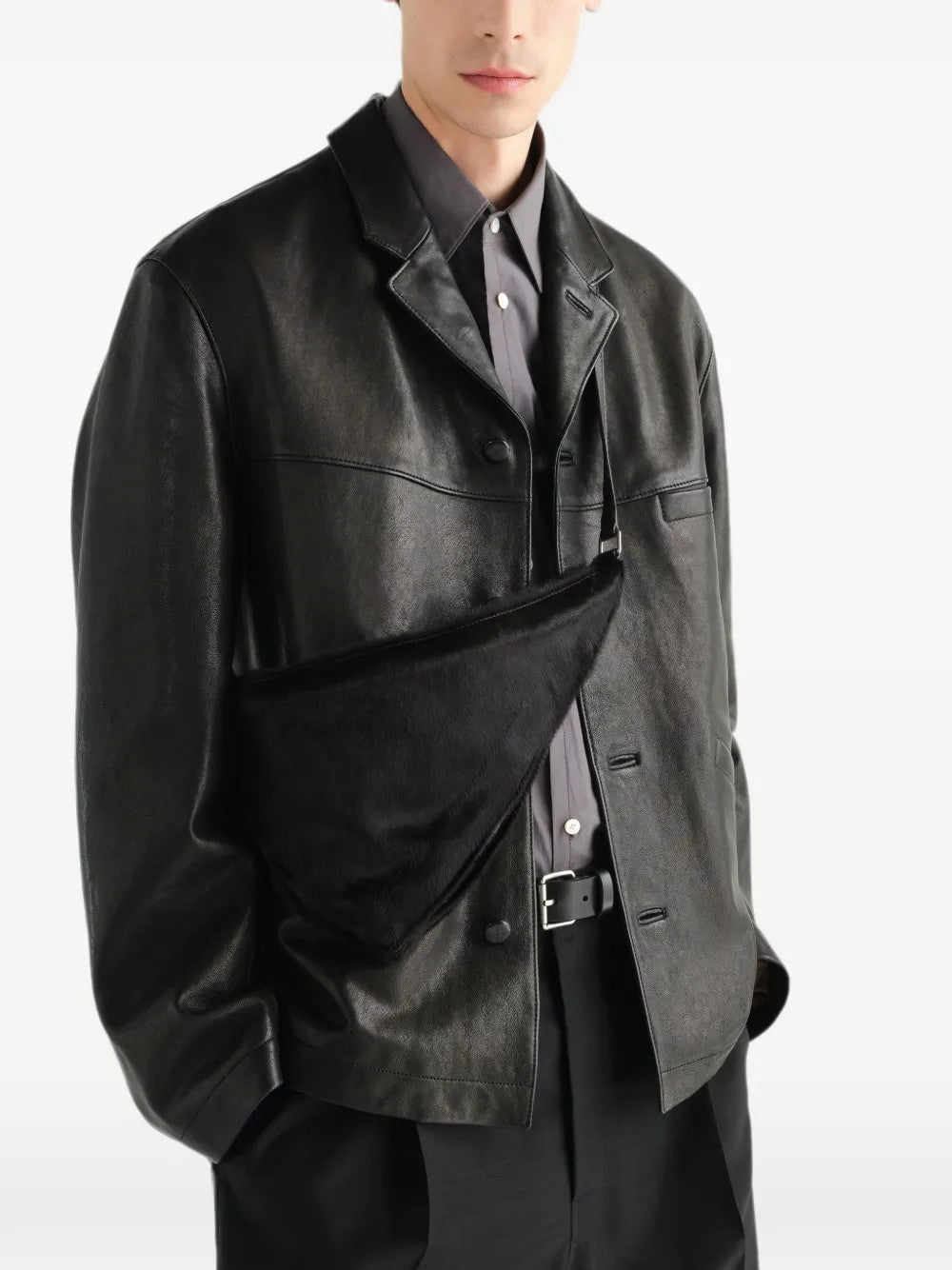 Black bag worn by a person, showing the bag fit