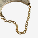 Close up of yellow bag showing texture of the leather fabric