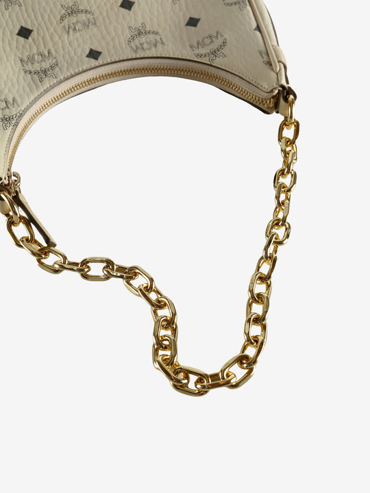 Close up of yellow bag showing texture of the leather fabric