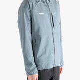 Blue jacket worn by a person, showing the jacket's fit