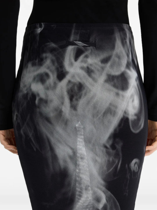Black skirt worn by a person, showing the skirt fit