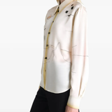 White shirts worn by a person, showing the shirts's fit