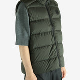 Green vest worn by a person, showing the vest's fit