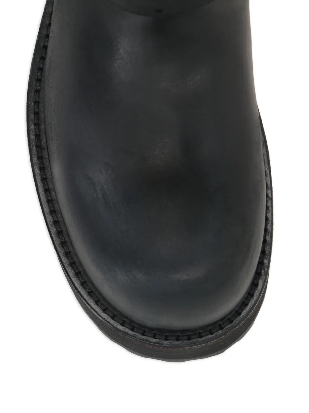 Close up of the black boot, showing texture of the calfskin fabric