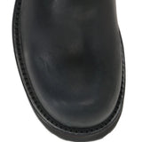 Close up of the black boot, showing texture of the calfskin fabric