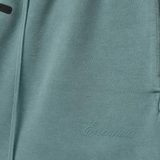 Close up of blue pants, showing texture of the cotton fabric