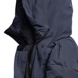 Close up of Navy jacket, showing texture of the 84% recycled polyester/ 16% organic cotton made fabric