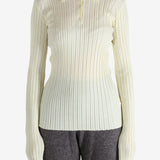 White shirt worn by a person, showing the shirt's fit