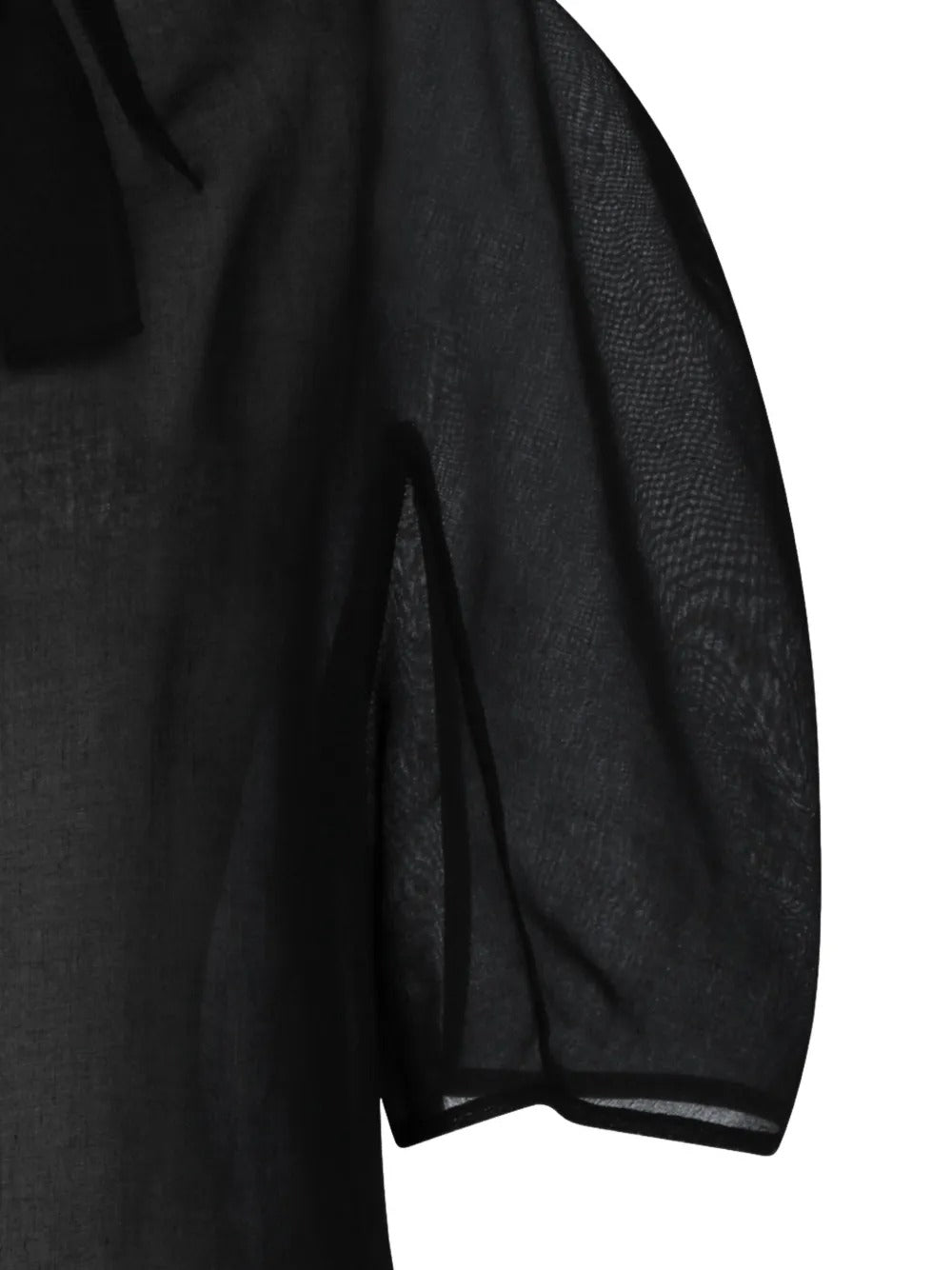 Close up of black top, showing texture of the polyester fabric