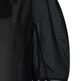 Close up of black top, showing texture of the polyester fabric