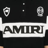 Close up of black t-shirt, showing texture of the cotton fabric