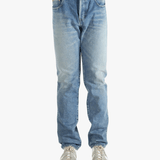 Blue jean worn by a person, showing the fit