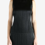 Black shirts worn by a person, showing the shirts fit