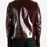 Burgundy jacket worn by a person, showing the jacket's fit