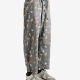 Grey pajama worn by a person, showing the pajama's fit