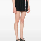 Black skirt worn by a person, showing the skirt’s fit