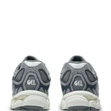 Grey sneakers, back view