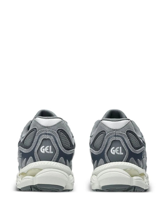 Grey sneakers, back view