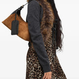 Brown bag worn by a person, showing the bag fit