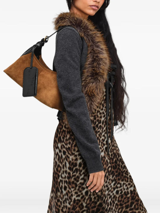 Brown bag worn by a person, showing the bag fit