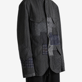 Grey jacket worn by a person, showing the jacket fit