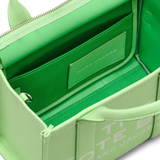 Close up of green bags,showing texture of the leather fabric.