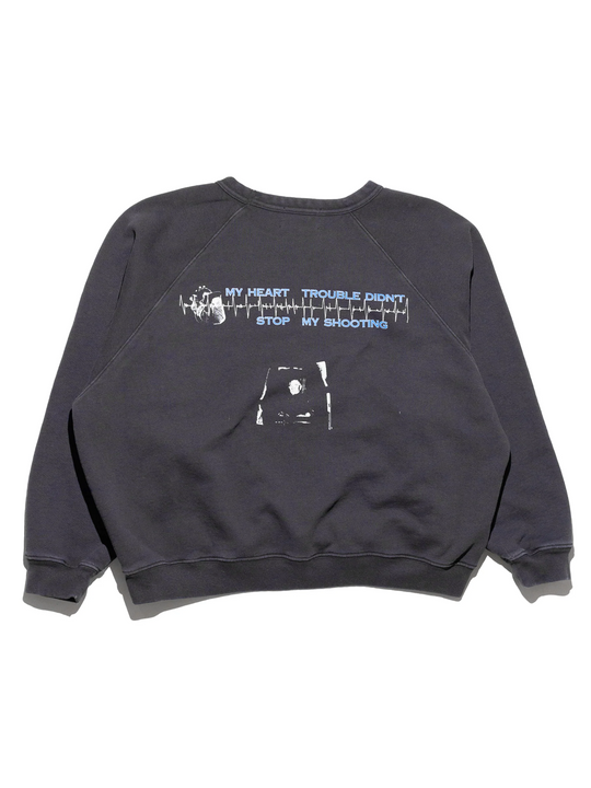 Black sweatshirt, back view showing printed pattern