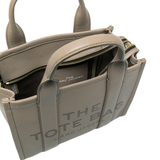 Close up of tan bag, showing texture of the calf leather fabric