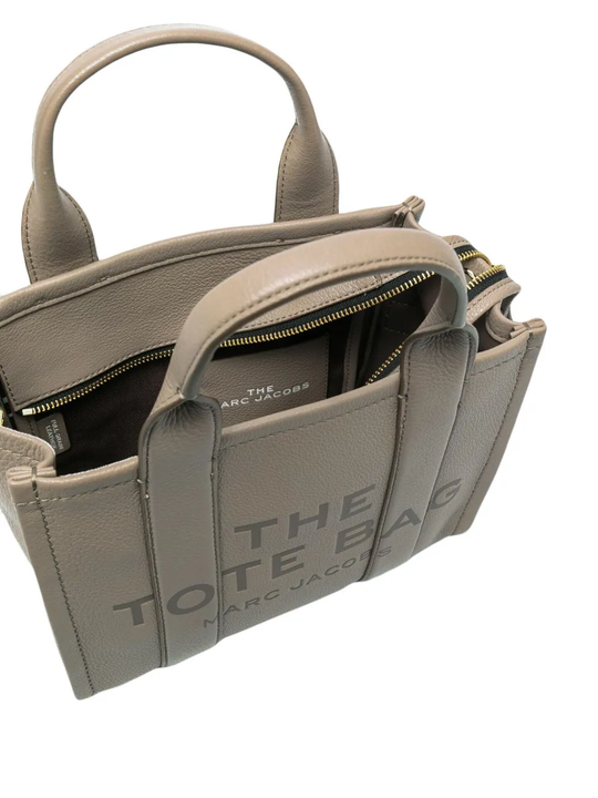 Close up of tan bag, showing texture of the calf leather fabric