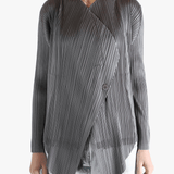 Grey cardigan worn by a person, showing the cardigan's fit