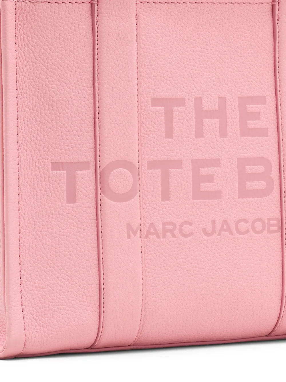 close up of pink bags, showing texture of the leather fabric
