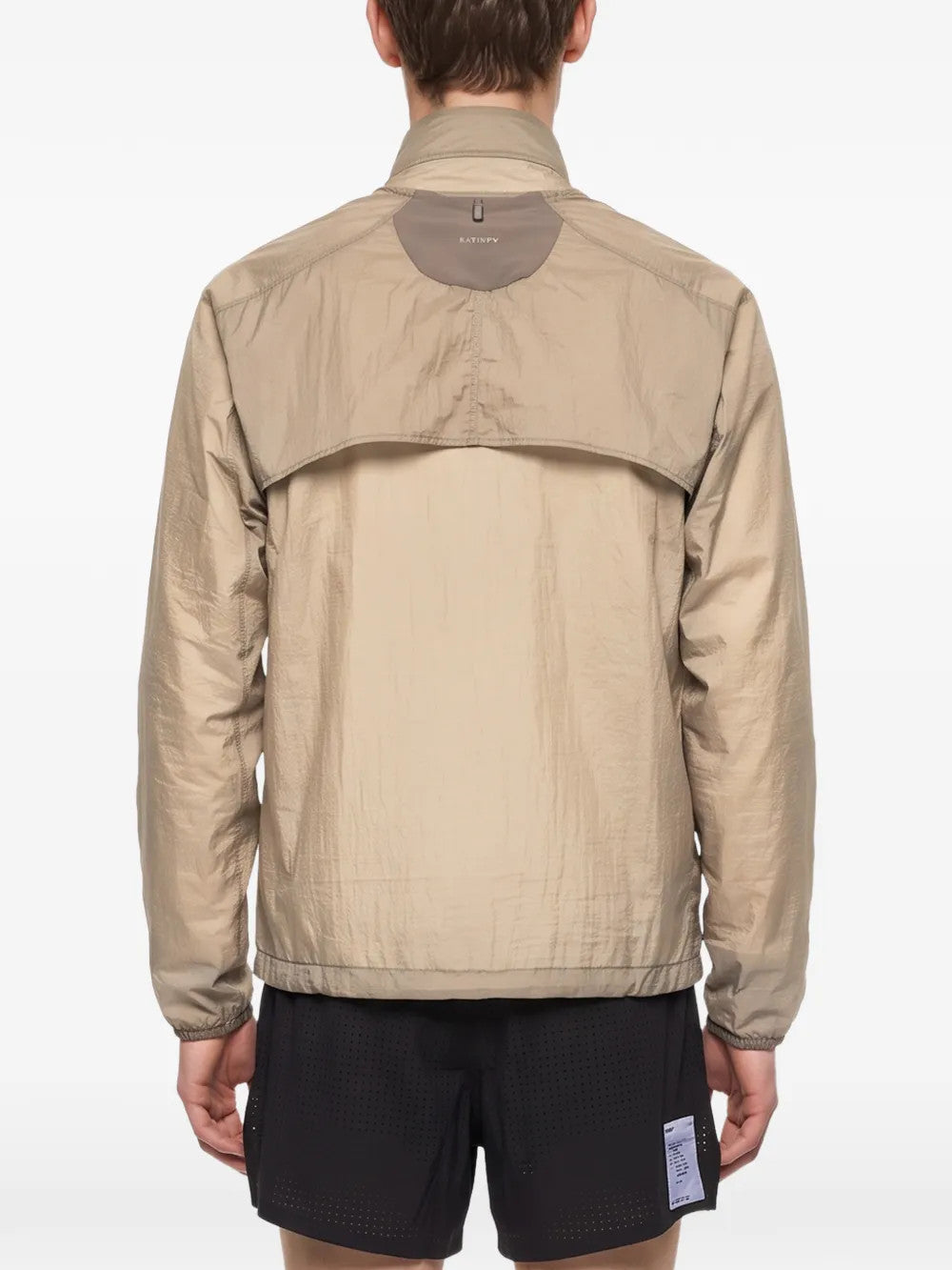Tan jacket, full body view