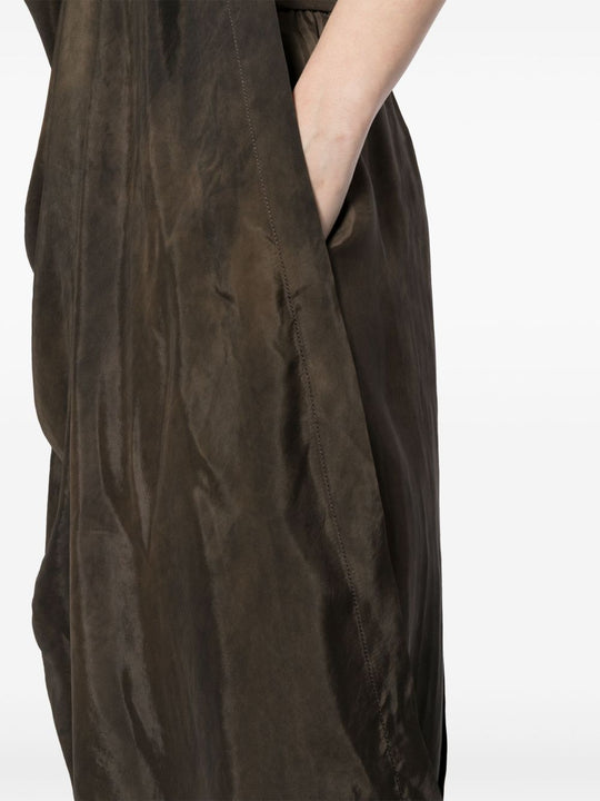 Unknown dress worn by a person, showing the dress fit