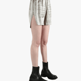 Grey shorts worn by a person, showing the shorts fit