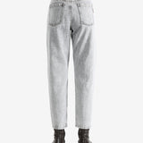 Grey pants worn by a person, showing the pants fit