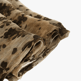 Close up of Tan scarf, showing texture of the 100% silk fabric