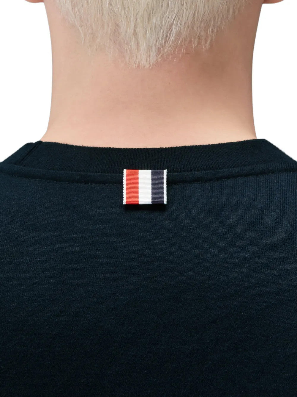Close up of White t-shirt, showing texture of the 100% cotton fabric