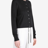 Black jacket worn by a person, showing the jacket fit